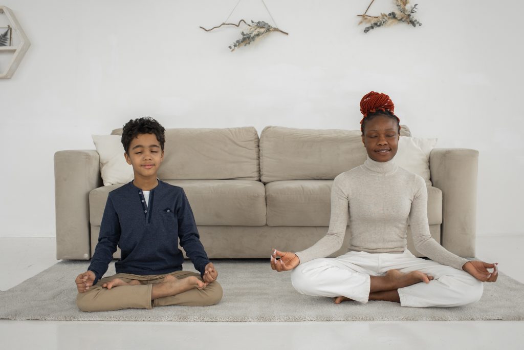 two children meditate